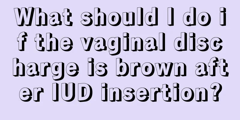 What should I do if the vaginal discharge is brown after IUD insertion?