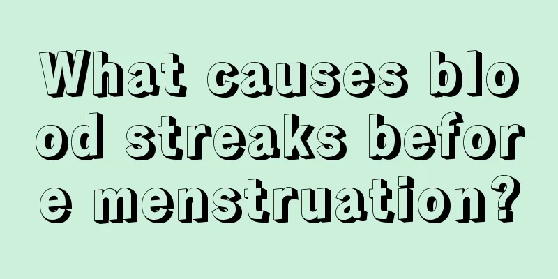 What causes blood streaks before menstruation?