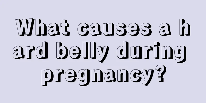 What causes a hard belly during pregnancy?