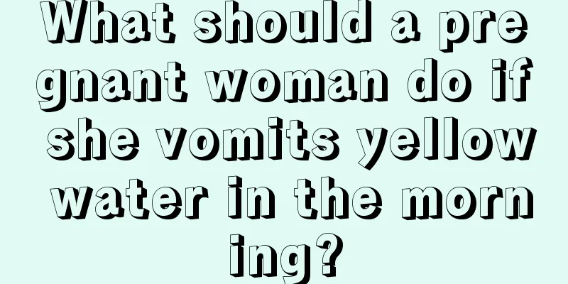 What should a pregnant woman do if she vomits yellow water in the morning?