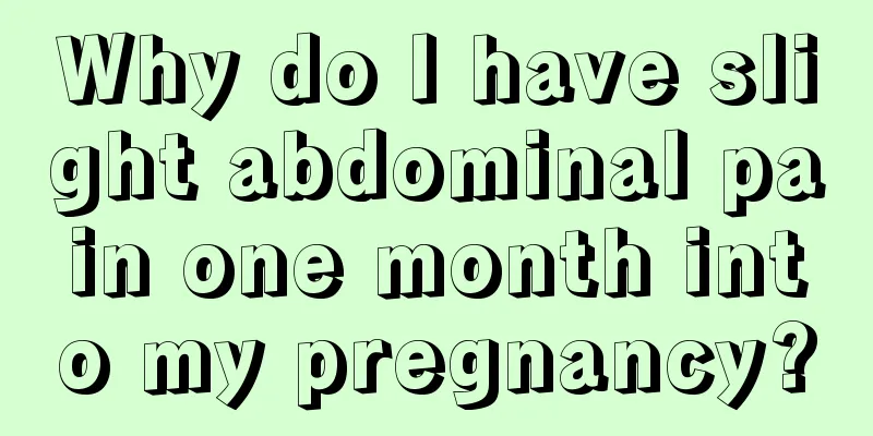 Why do I have slight abdominal pain one month into my pregnancy?