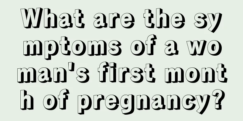 What are the symptoms of a woman's first month of pregnancy?