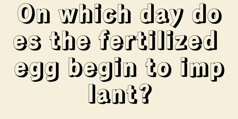 On which day does the fertilized egg begin to implant?