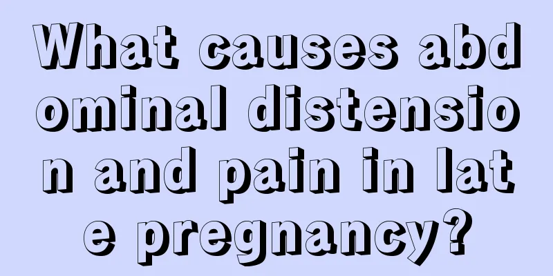 What causes abdominal distension and pain in late pregnancy?