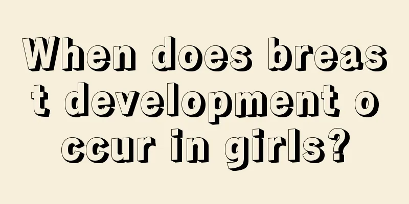 When does breast development occur in girls?