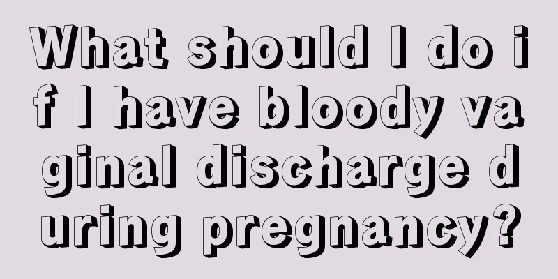 What should I do if I have bloody vaginal discharge during pregnancy?