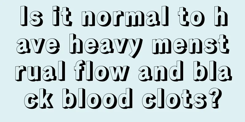 Is it normal to have heavy menstrual flow and black blood clots?