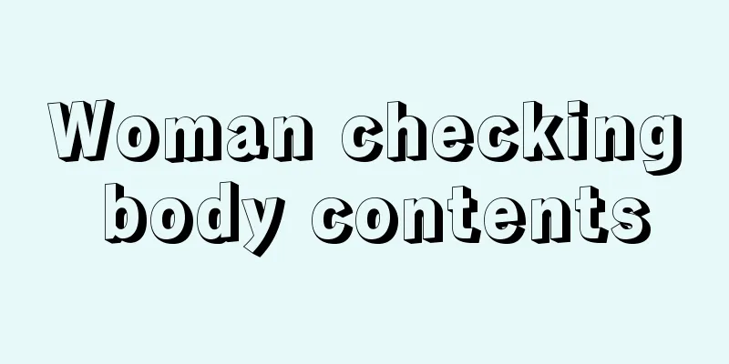 Woman checking body contents