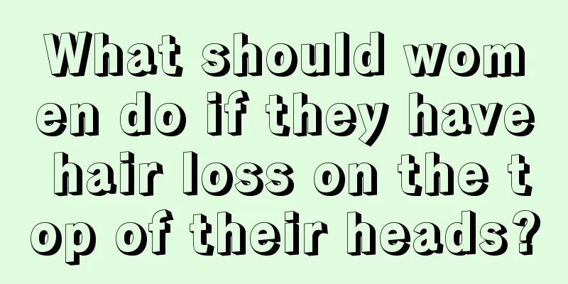 What should women do if they have hair loss on the top of their heads?