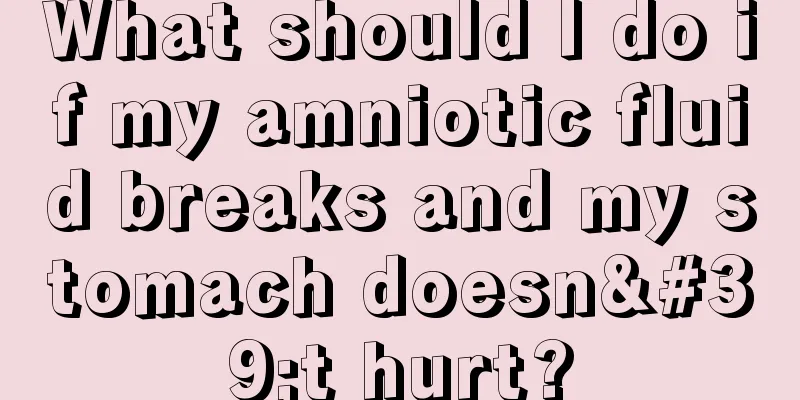 What should I do if my amniotic fluid breaks and my stomach doesn't hurt?