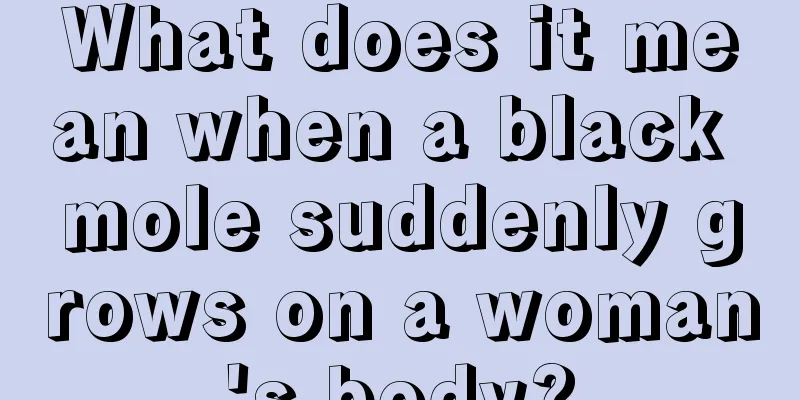 What does it mean when a black mole suddenly grows on a woman's body?