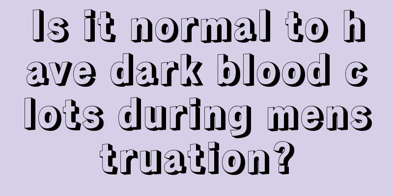 Is it normal to have dark blood clots during menstruation?