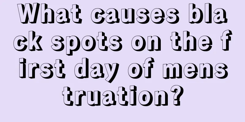 What causes black spots on the first day of menstruation?