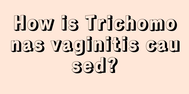 How is Trichomonas vaginitis caused?